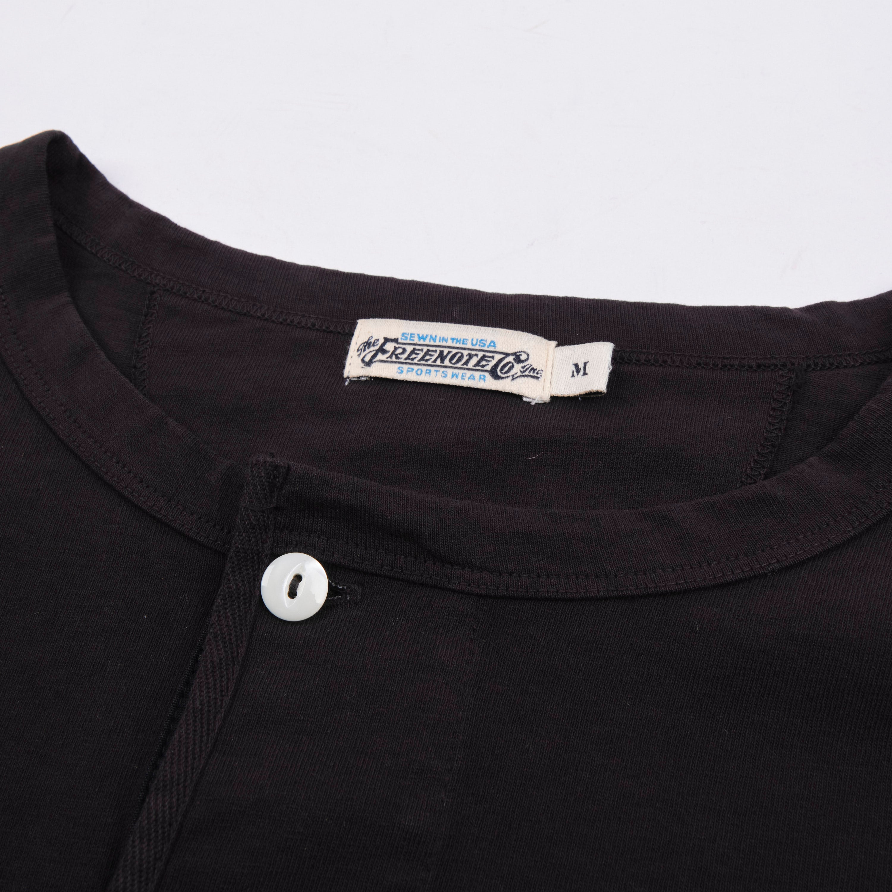 9 Ounce Henley L/S Black