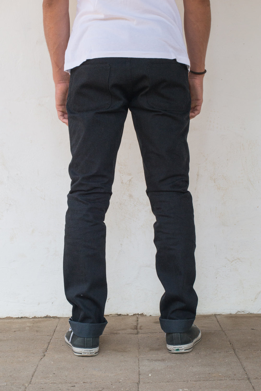 Avila Slim Taper - Raw 14.25 oz Black Grey Denim On Model Back Side