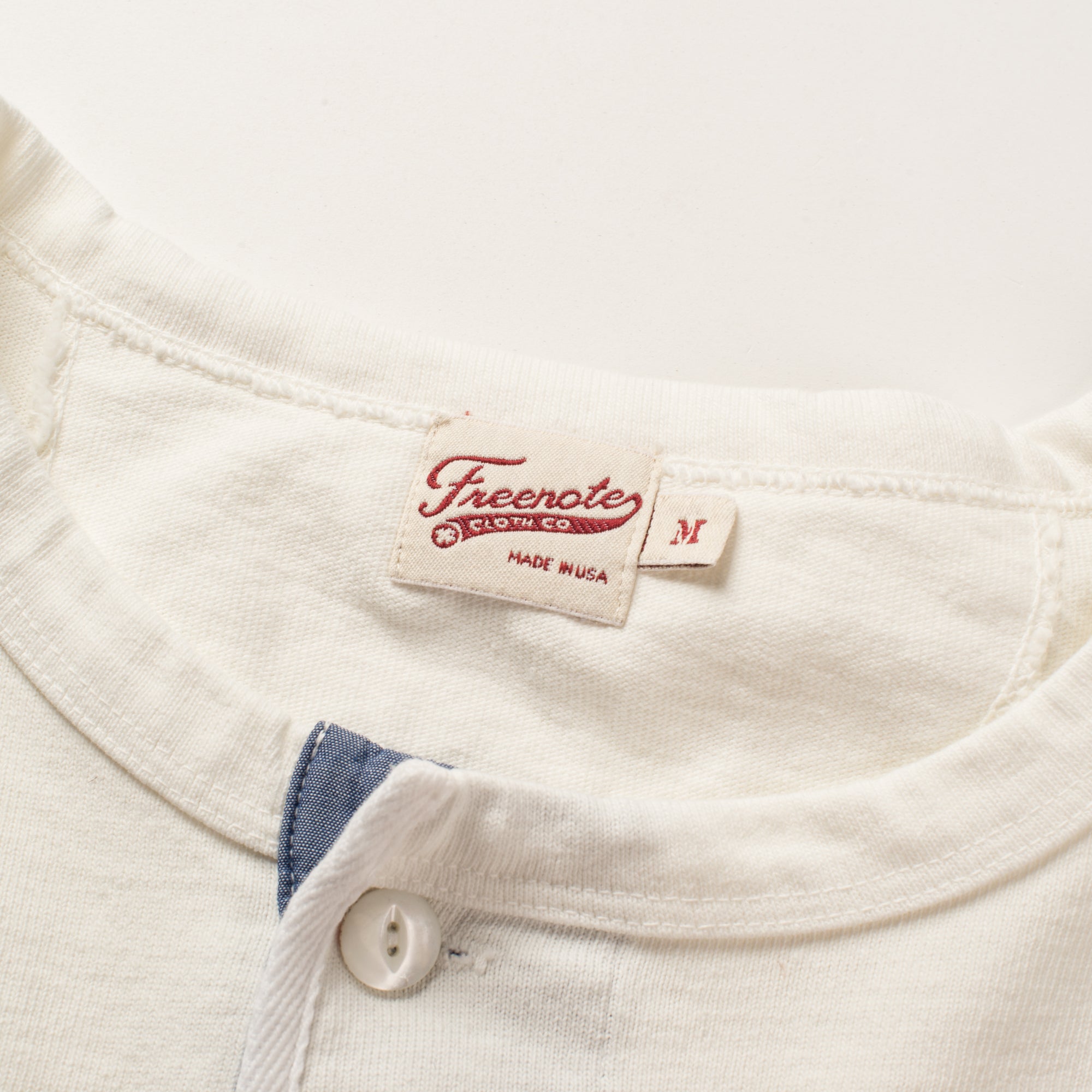 13 OUNCE HENLEY WHITE Tag